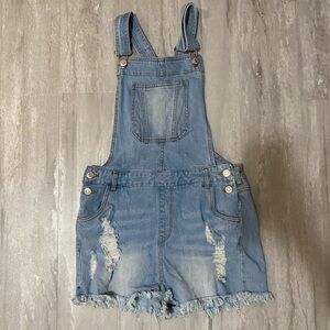 Y2K inspired distressed jean overalls